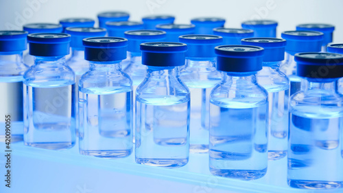 Group of Vaccine bottles. Medicine in ampoules. Glass vials for liquid samples in laboratory.
