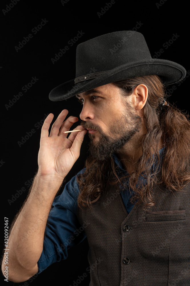 Cowboy with guns. Studio shooting Cowboy with guns. Studio shooting