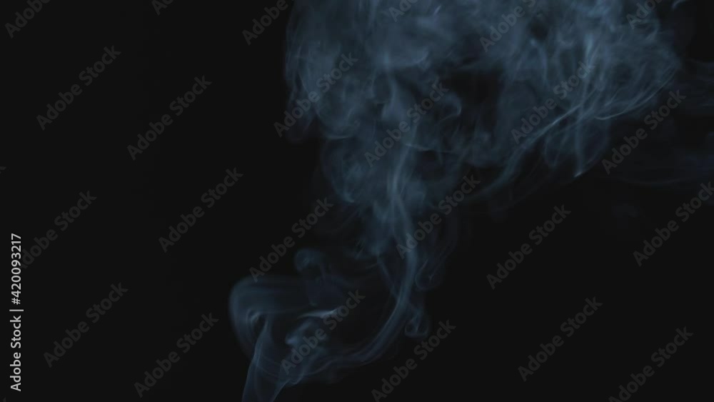 White Smoke Rises Up To The Air, Black Background
White Smoke Rises Up To The Air, Black Background