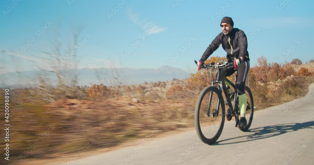 Senior man riding a bike Senior man riding a bike