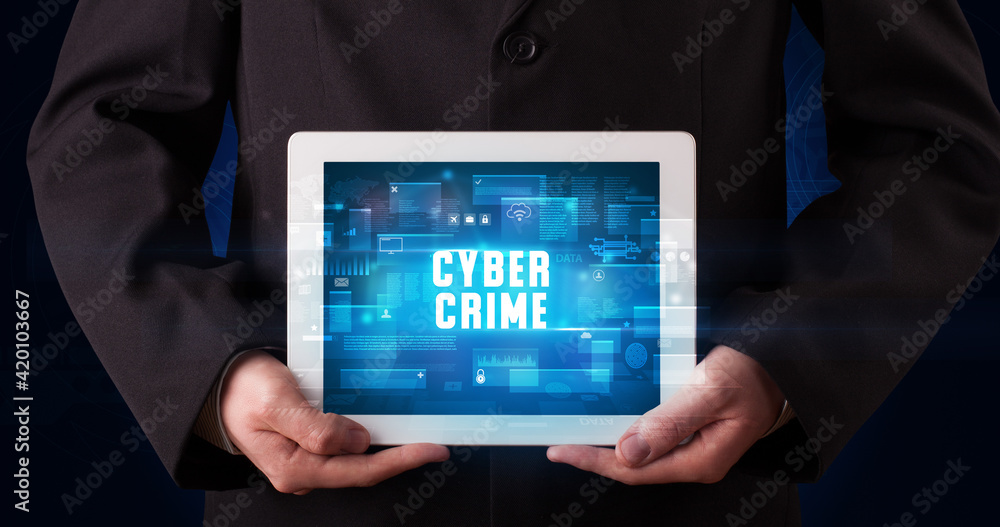 Person holding tablet, security concept Person holding tablet, security concept