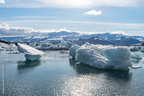 Icebergs in Jokulsarlon glacial lagoon on a beautiful sunny afternoon in famous Icelandic travel location