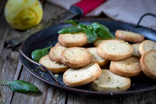 Shortbread cookies with lemon zest and basil