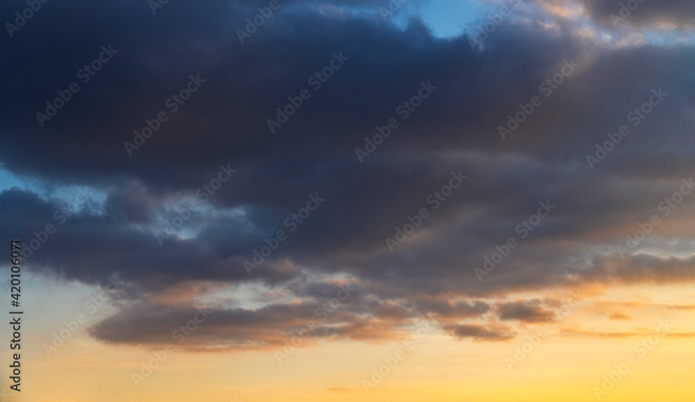 Beautiful colorful sunset sky with dramatic clouds Nature sky clouds background.
