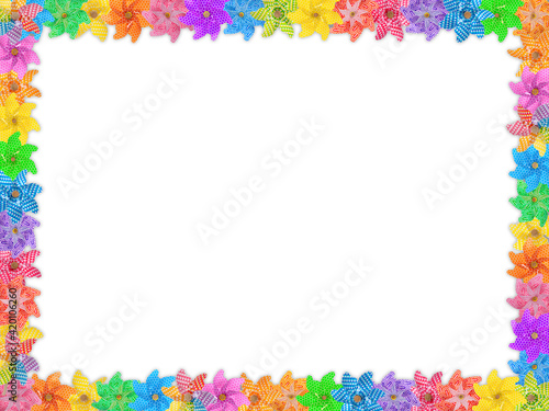 trendy rainbow colored pinwheels in a border with room for text.