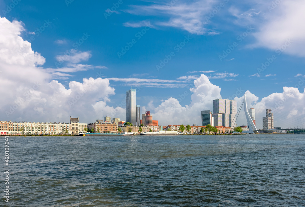 Rotterdam city cityscape skyline with Erasmus bridge and river. South Holland, Netherlands.