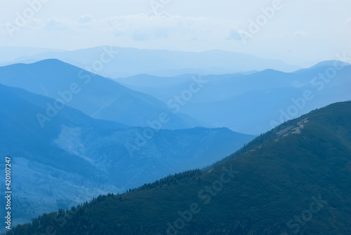 mountain chain blue silhouette, natural travel background