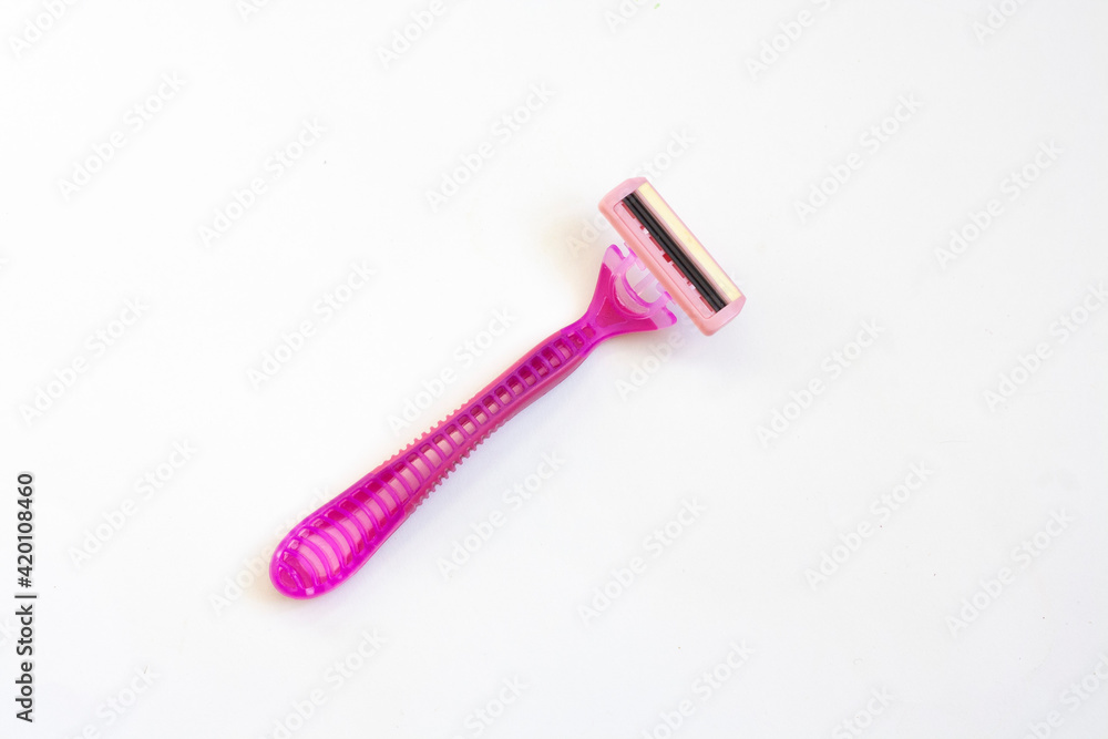Women's pink depilatory razor isolated on white background Women's pink depilatory razor isolated on white background