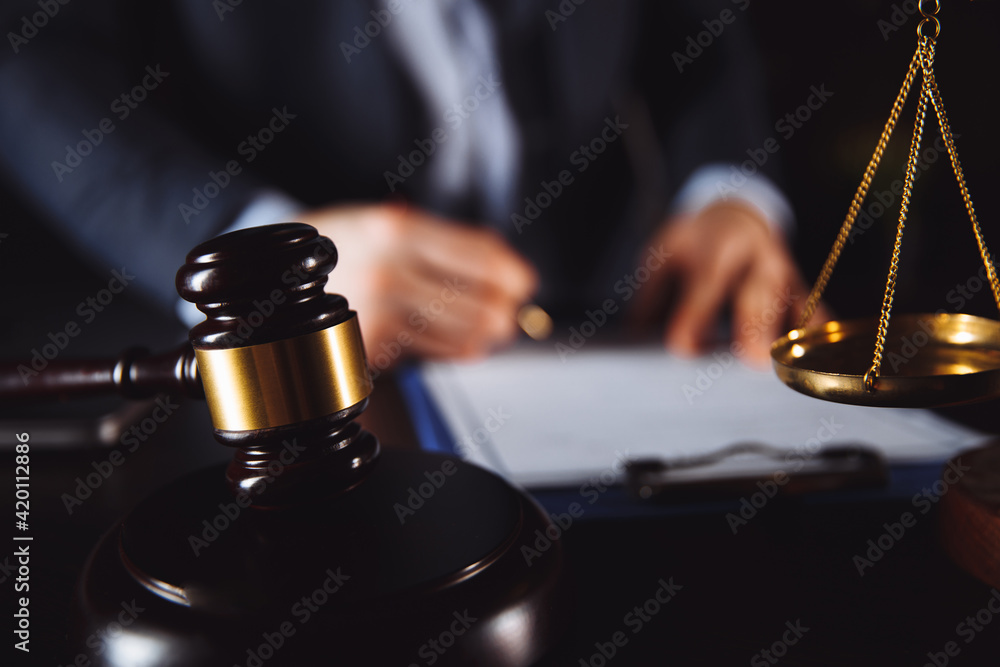 Law concept. Businessman in office working with documents. Law concept. Businessman in office working with documents.