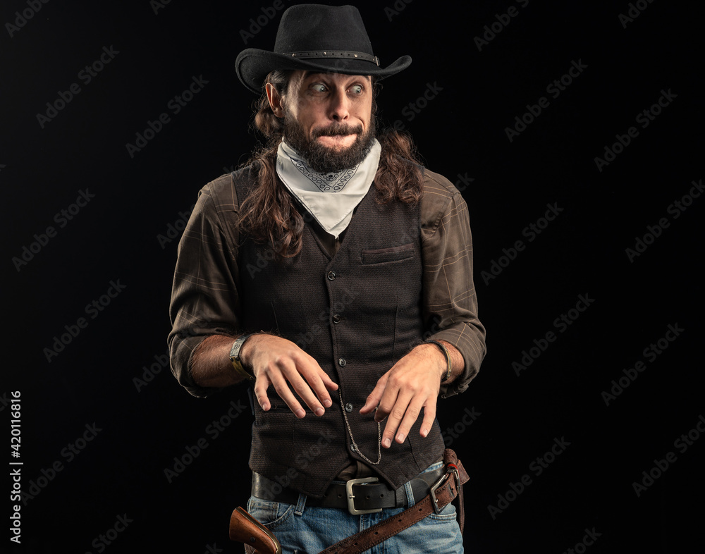 Cowboy with guns. Studio shooting Cowboy with guns. Studio shooting