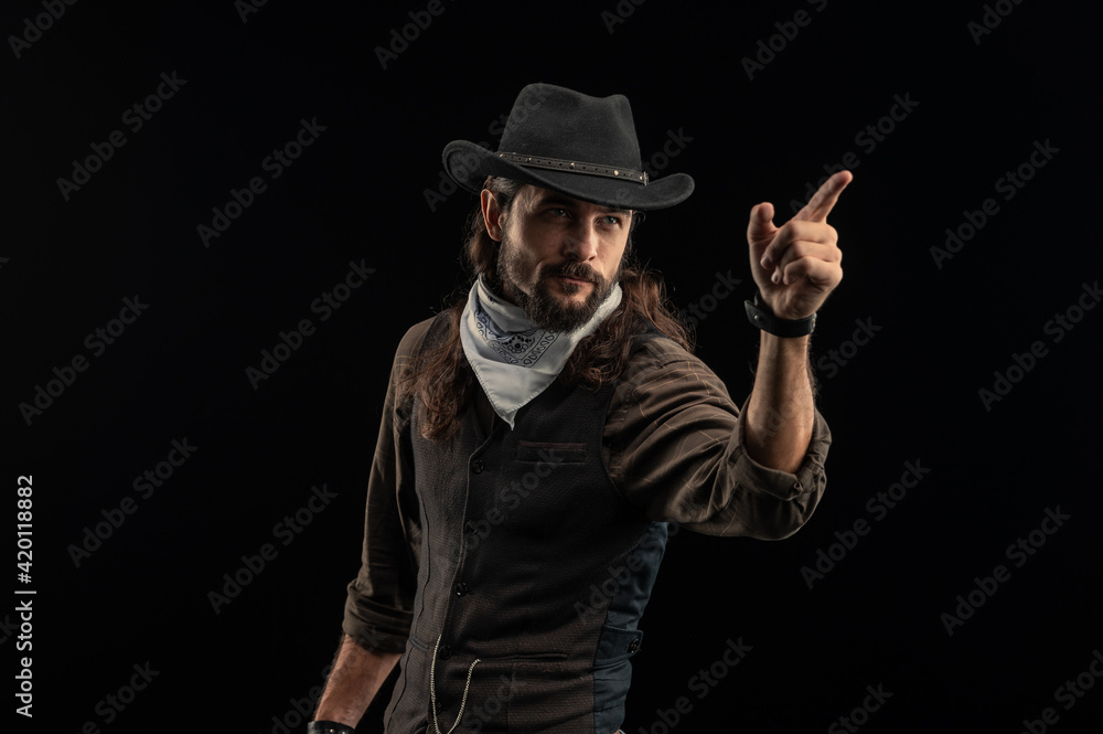 Cowboy with guns. Studio shooting Cowboy with guns. Studio shooting