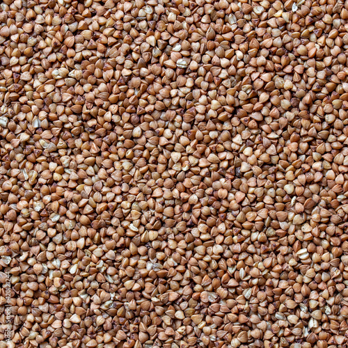 background of close up of buckwheat groats 