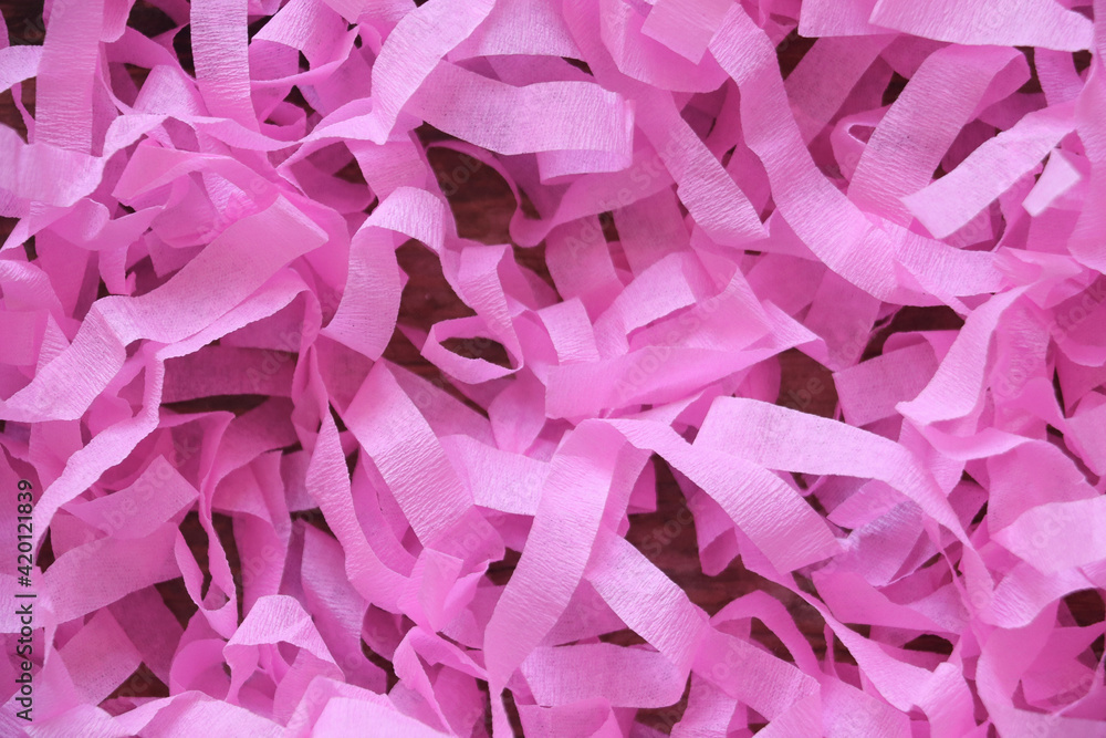 Fototapeta premium Background of pink pieces of paper