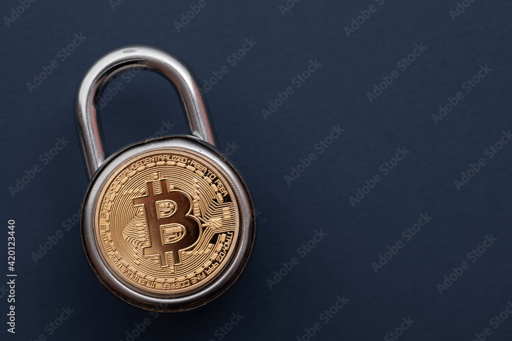 Bitcoin padlock. Cryptocurrency investment security and safety concept Bitcoin padlock. Cryptocurrency investment security and safety concept