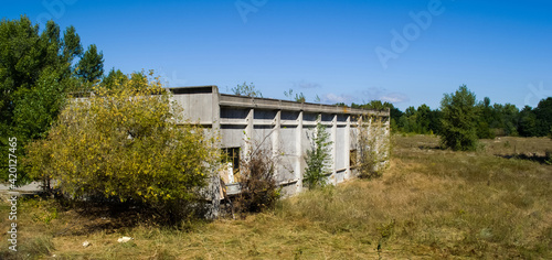 Abandoned residential buildings in village of Orbita near the Chyhyryn Nuclear Power Plant. Abandoned and destroyed. photo