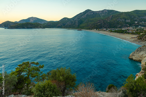 View of Oludeniz beach and Blue Lagoon in Mugla region, Turkey on sunrise. Summer holiday travel destination