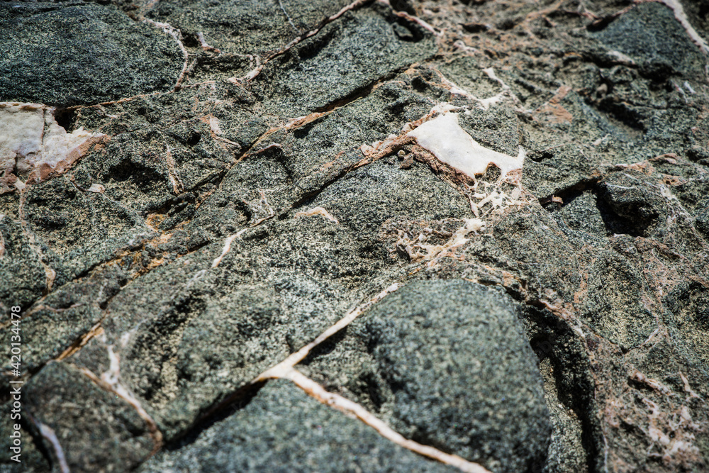 Colorful rock texture. Natural cracks void. Colorful rock texture. Natural cracks void.