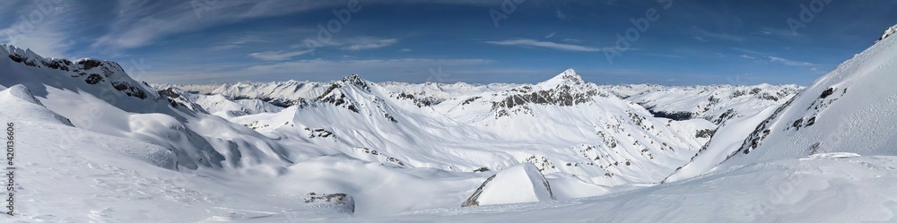 piz ducan mountain range in ducan valley. View of the glacier and the snow-covered mountains. Skimo mountaineering