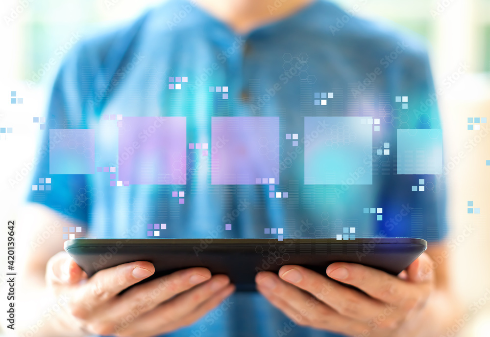 Digital square boxes with man using a tablet Digital square boxes with man using a tablet