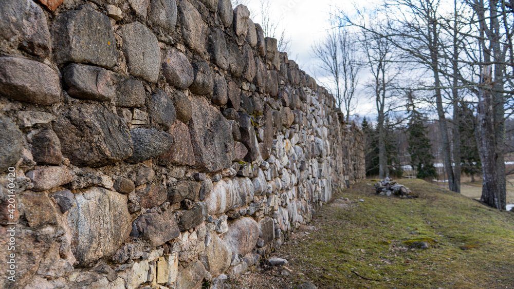 Araishi (Araisi) Stone Walls Medieval Castle Ruins in Latvia, Gauja National Park. Castle Was Built in the 14th - 17th Century. Araishi (Araisi) Stone Walls Medieval Castle Ruins in Latvia, Gauja National Park. Castle Was Built in the 14th - 17th Century.