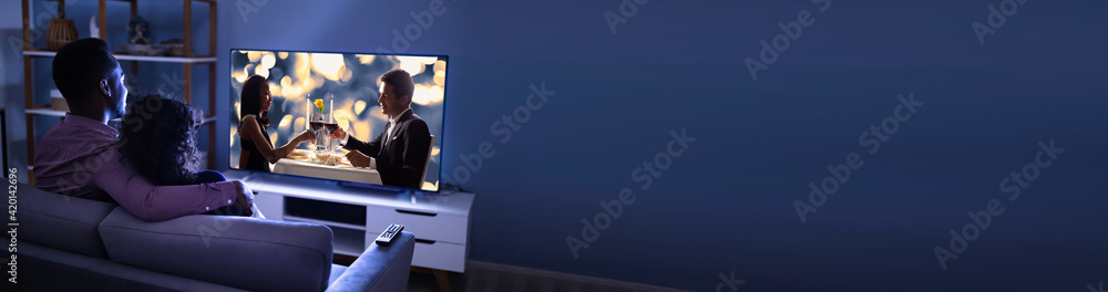 © Andrey Popov - Affectionate Family Watching TV © Andrey Popov - Affectionate Family Watching TV