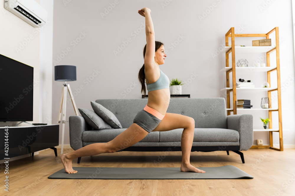 Woman In Fitness Wear Doing Lunges Exercise Woman In Fitness Wear Doing Lunges Exercise