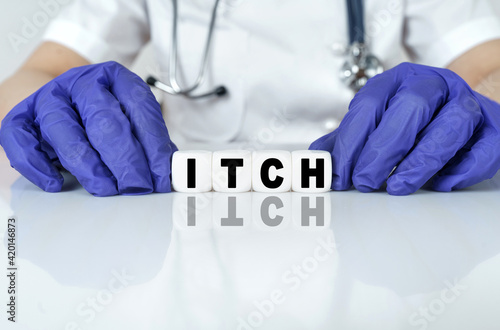 The doctor put together a word from cubes ITCH