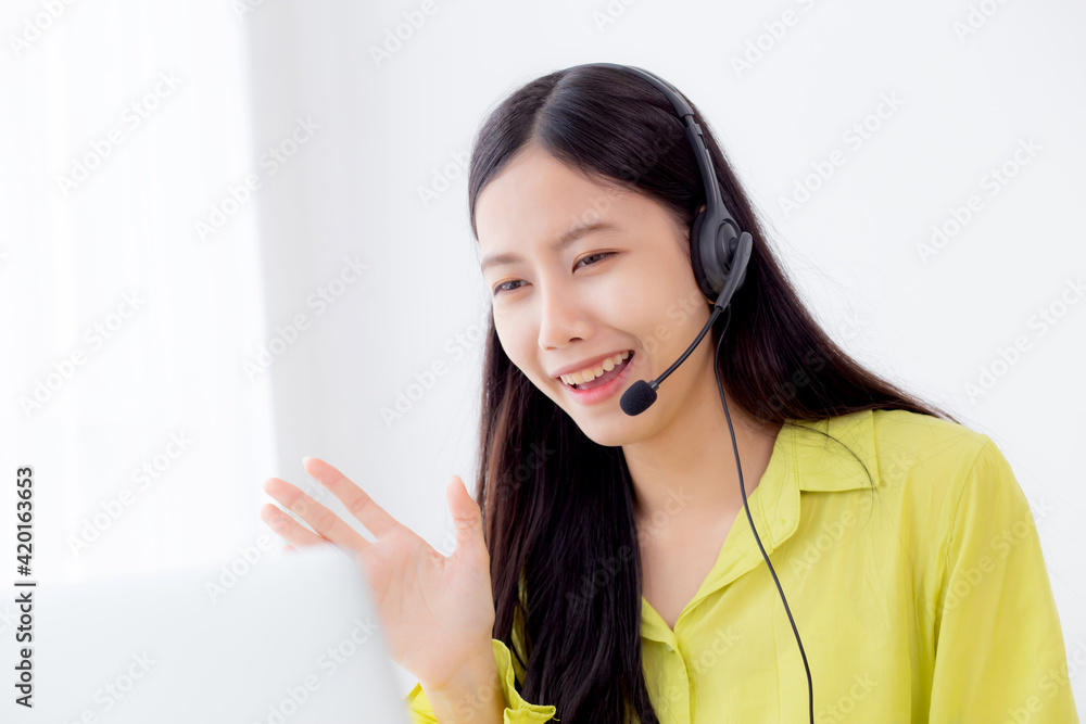 Young asian business woman using laptop computer for video conference online with social distancing, businesswoman working with video call, new normal, communication and work from home concept. Young asian business woman using laptop computer for video conference online with social distancing, businesswoman working with video call, new normal, communication and work from home concept.