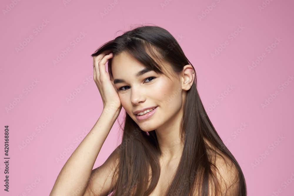 brunette bare shoulders clear skin body care pink background brunette bare shoulders clear skin body care pink background