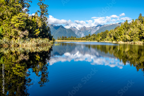 Fototapeta Naklejka Na Ścianę i Meble -  The Southern Alps reflecting in Matheson Lake. South Island, New Zealand.