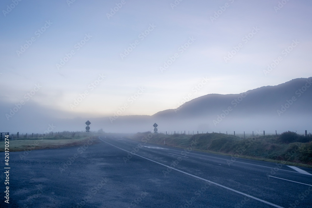 The road on a misty morning. South Island, New Zealand.