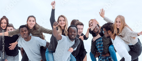 group of diverse fun-loving young people standing together