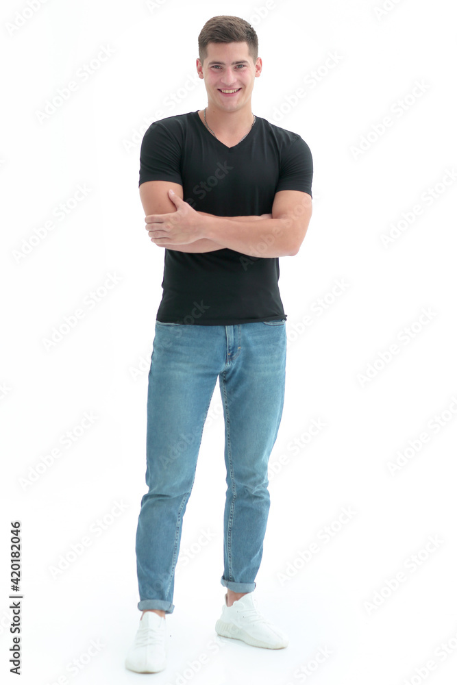 in full growth. casual guy in black t-shirt in full growth. casual guy in black t-shirt