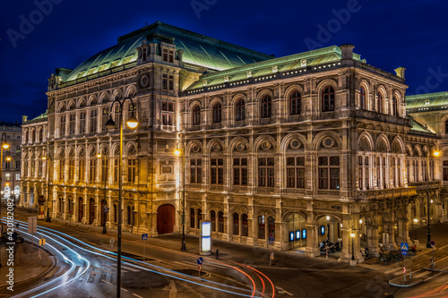 Long exposure shot of national state opera with lights in the night in Vienna, Austria