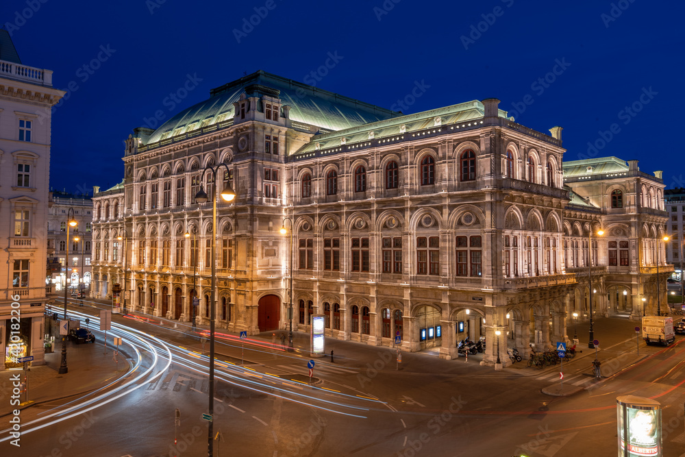 Long exposure shot of national state Opera with lights in the night in Vienna, Austria