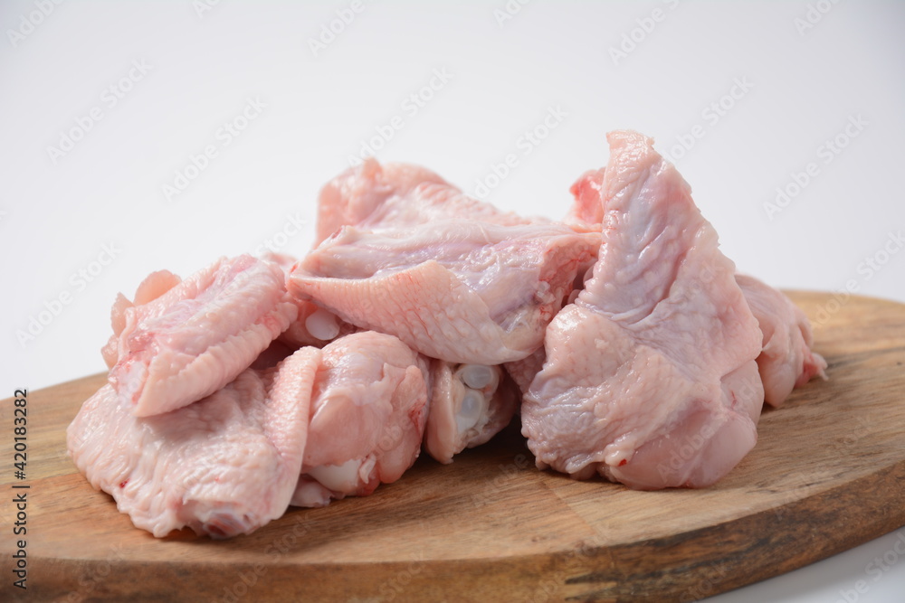 Raw cut chicken wings ready for barbeque Raw cut chicken wings ready for barbeque