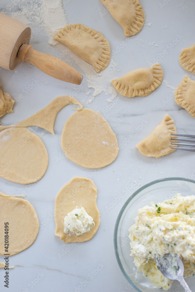 Pierogi ruskie, Baked dumplings stuffed with curd cheese and potatoes Pierogi ruskie, Baked dumplings stuffed with curd cheese and potatoes