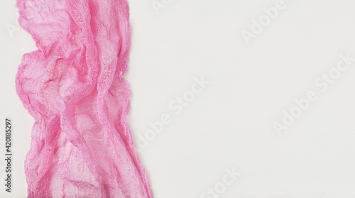 Pink folded cotton textile ...