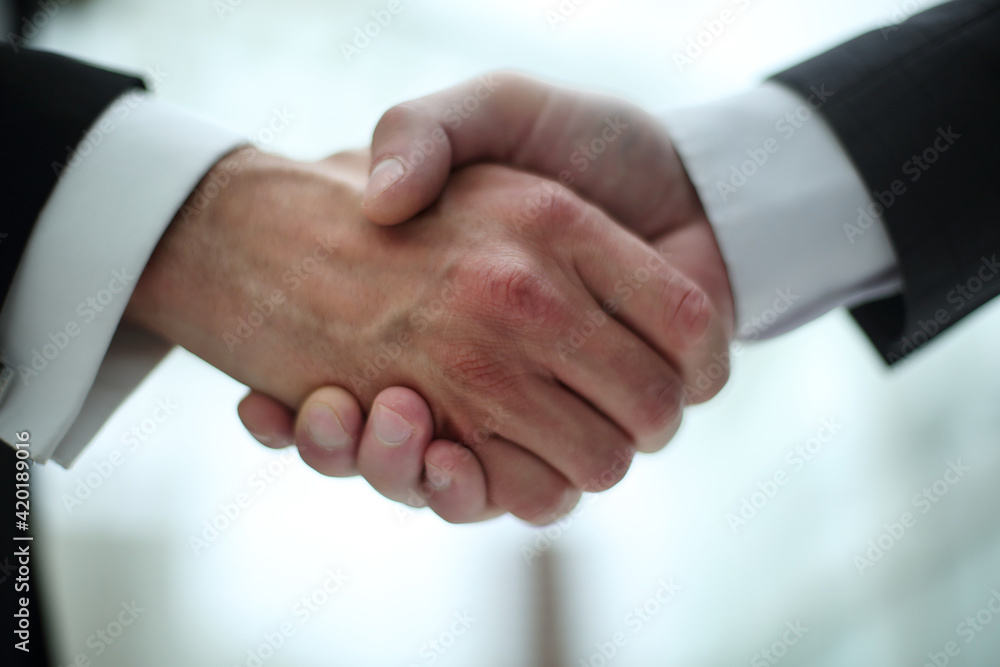 close up. reliable business partners shaking hands close up. reliable business partners shaking hands