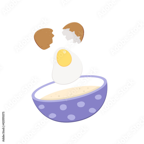 Broken egg falls into the cup. Breakfast preparation concept