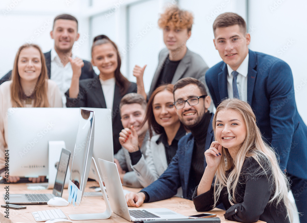portrait of a happy business team at an office Desk portrait of a happy business team at an office Desk