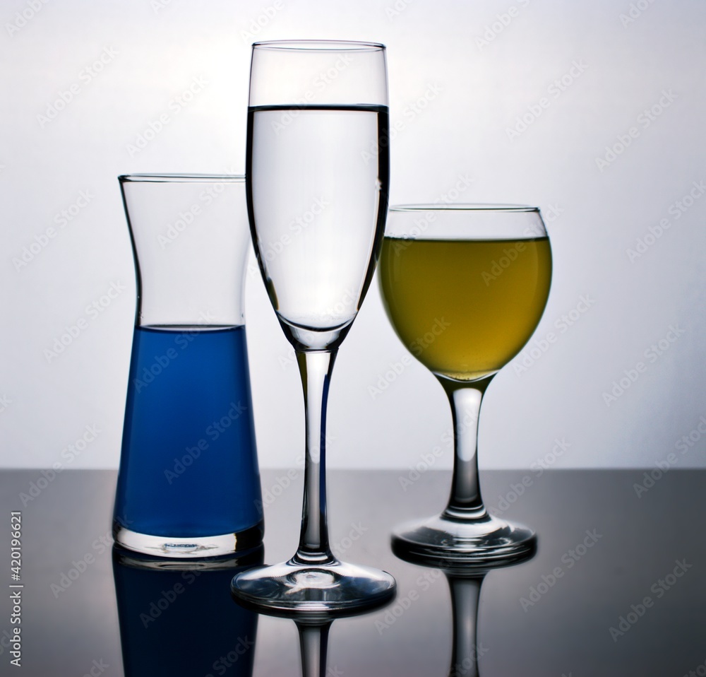 glass of wine isolated in black and white image ,full wine in glass on dark background ,different glass together ,glass of champagne glass of wine isolated in black and white image ,full wine in glass on dark background ,different glass together ,glass of champagne