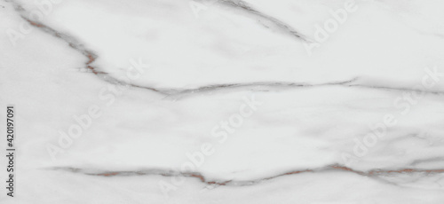 White carrara marble texture background with curly grey colored veins, it can be used for interior-exterior home decoration and ceramic decorative tile surface, wallpaper, architectural slab. © Tomas Paas