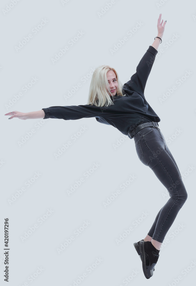 Naklejka premium in full growth. happy young modern woman.