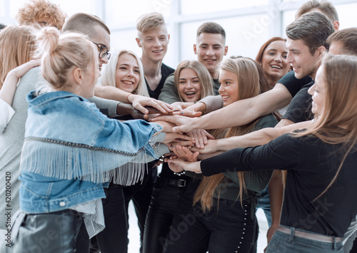 close up. a group of young people showing their unity.