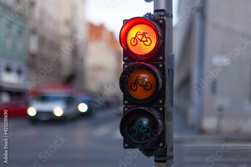 traffic light for bicycles with a glowing red sign