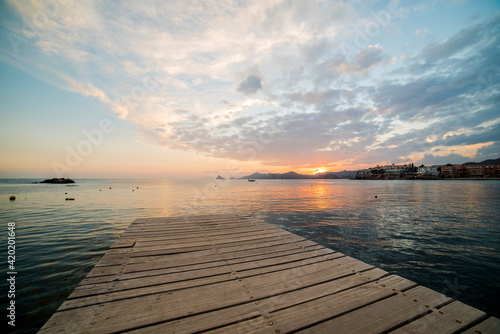 Wonderful sunset from a pier in Calabardina, Aguilas, Spain