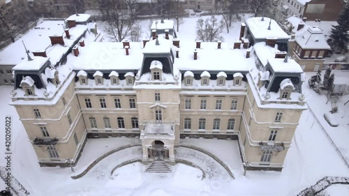 aerial view of potockih palace winter snowstorm photo