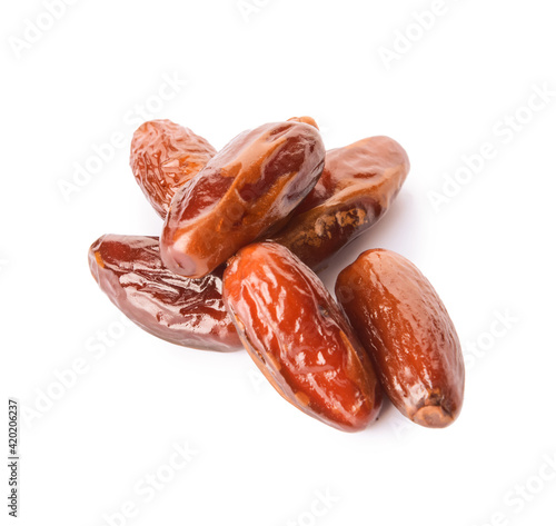 Sweet dried dates on white background