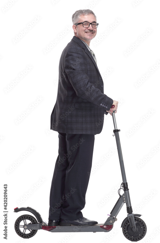 man with an electric scooter pointing at a white screen man with an electric scooter pointing at a white screen